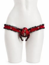 Load image into Gallery viewer, Black & Red Lace elastic support strap shown from the front on a display mannequin; cage not included