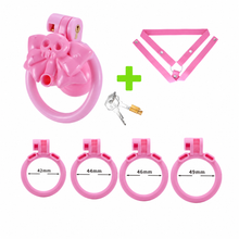 Lade das Bild in den Galerie-Viewer, Pink skull chastity cage with pink three-way belt and four rings