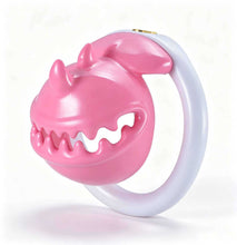 Load image into Gallery viewer, Pink and white Monster Mouth chastity cage from an angled view
